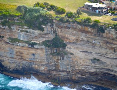 o14 ocean cliffs with modern home